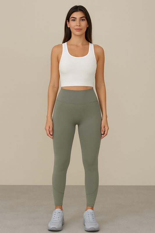 Model wearing high-waisted sculpt active leggings by Flexline, body-contouring gymwear activewear